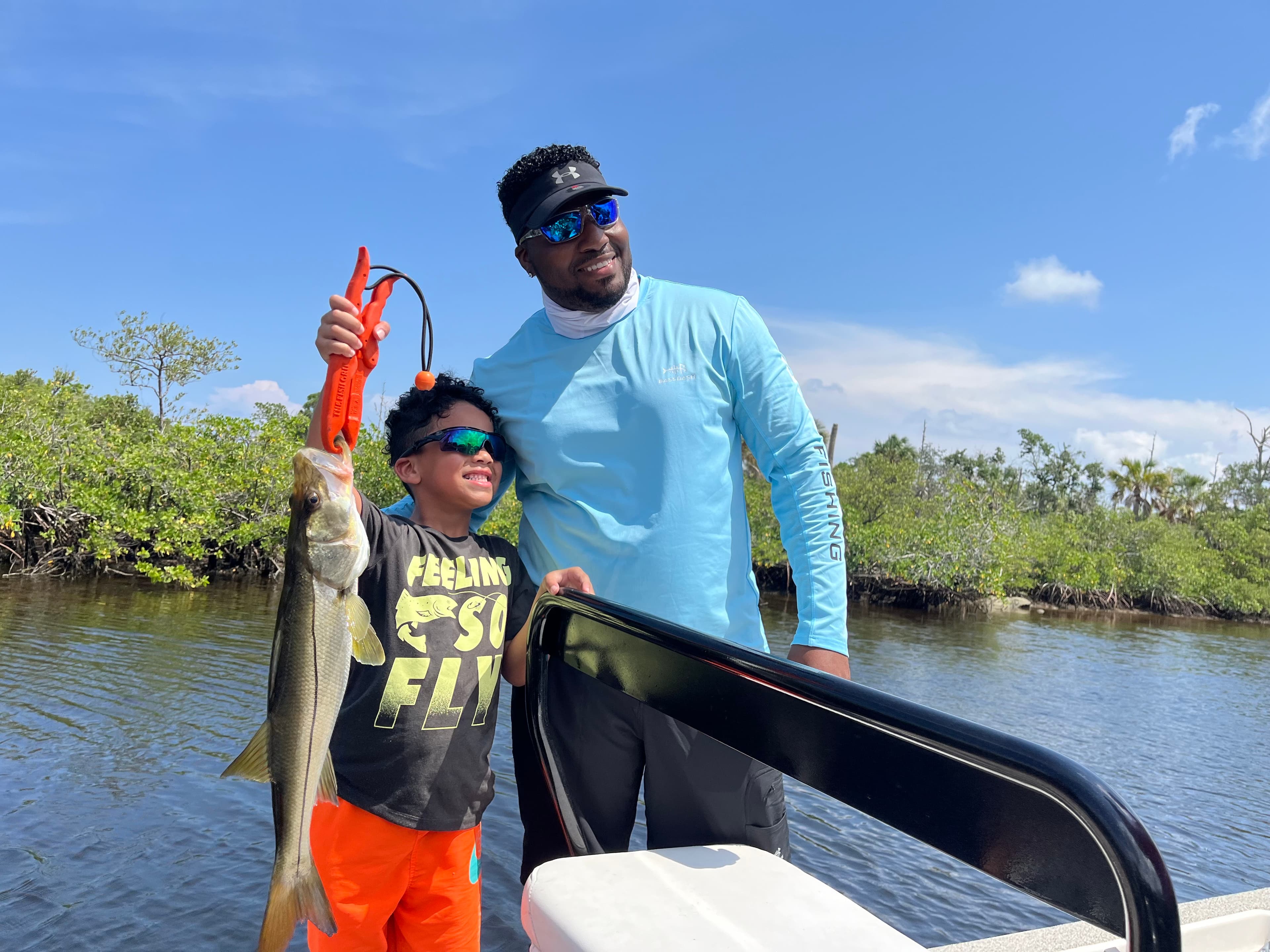Kid fishing on charter